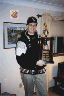 Thomsen Holding the Trophy