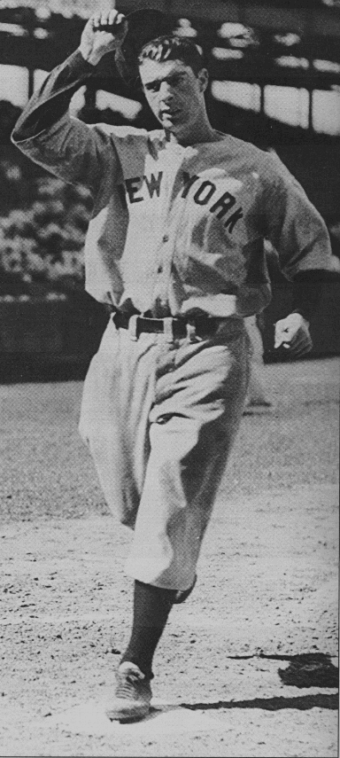 Joe DiMaggio crossing home plate.
